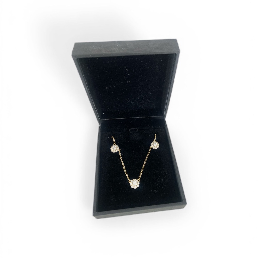 18” Elegant Gold over 925 sterling silver necklace with 5 stone flowers.